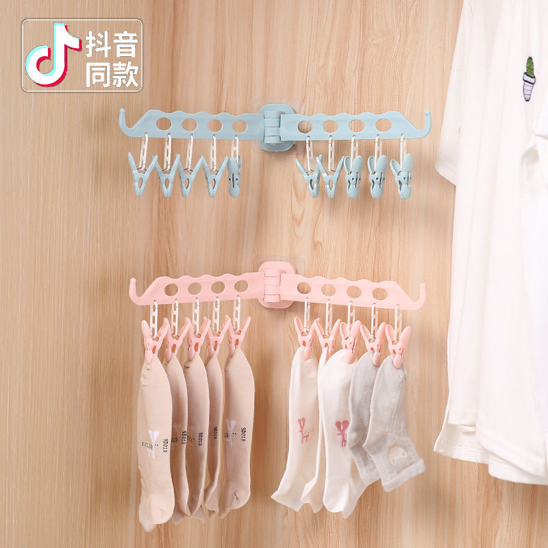 Non perforated wall mounted multi-function clothes hanger with multi clip in bathroom