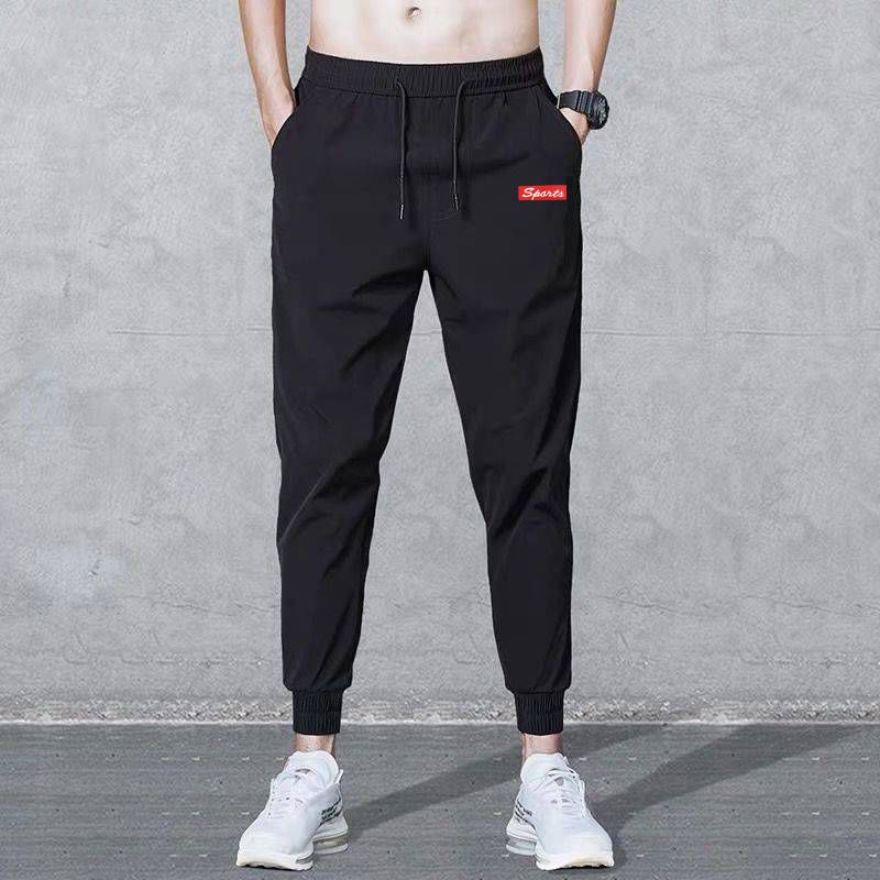 Spring and autumn casual pants men's loose plus size sports pants all-match men's harem pants stretch leg pants trend nine points