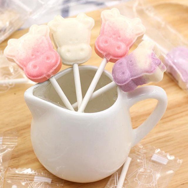 网红可爱卡通牛头奶棒糖创意儿童奶味棒棒糖宝宝小奶片糖果