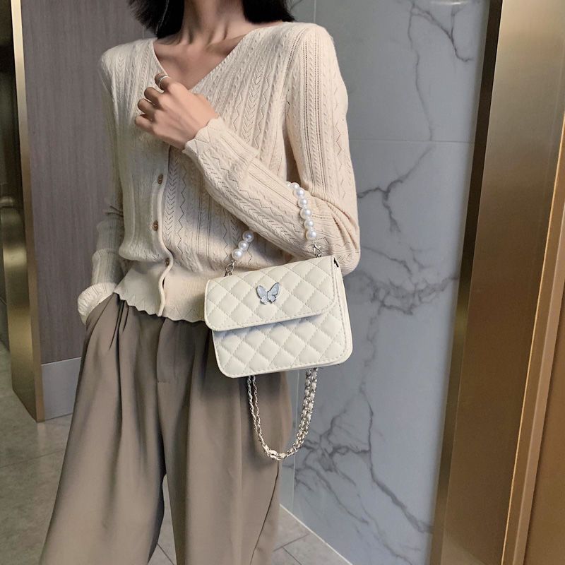 Last New Autumn Popular Texture Pearl Handheld Skew Straddle Small Bag for Women 2021 New Fashionable Style Lingge Bag