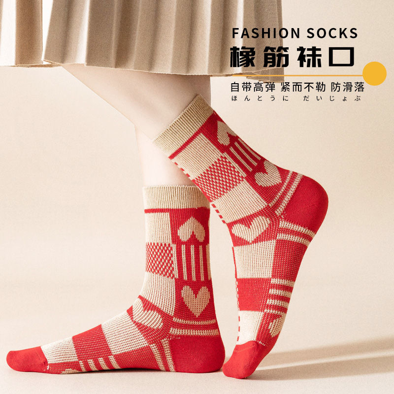 Red socks women's natal year Korean version of the mid-tube ins tide autumn and winter stepped on the villain to marry the year of the ox pure color cotton stockings