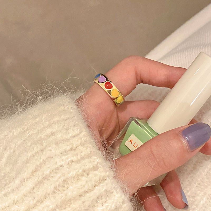 Korean autumn and winter ring female ins internet celebrity retro versatile simple color dripping oil love pearl ring cold style