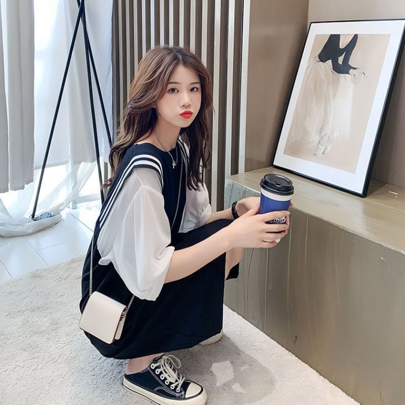 Fat MM extra large size 300 catties T-shirt skirt 2023 spring and summer loose belly hidden meat showing thin fake two-piece contrast color dress