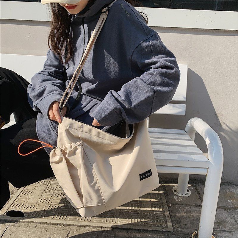 韓版斜挎包女背包簡約百搭上課包2021新款潮大容量學生單肩包挎包