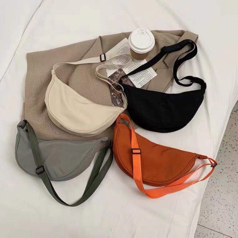 尼龍斜挎包包女2021新款潮餃子包輕便小挎包腋下包百搭單肩帆布包