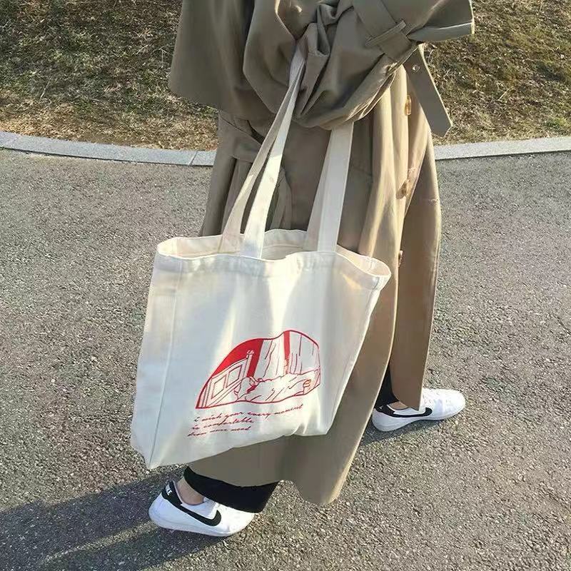 包包女2021新款ins帆布包學生小眾素描韓系慵懶風百搭單肩購物袋