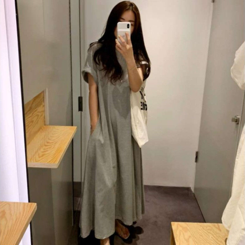 Fat MM extra large size 300 catties pregnant woman long skirt 2023 summer loose hidden meat slimming solid color knee-length dress