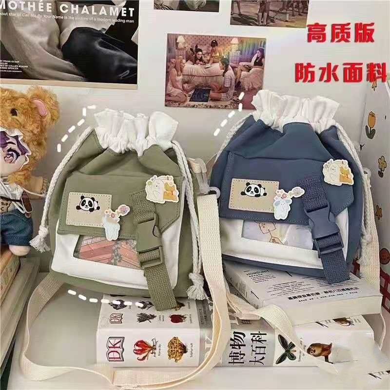 2021新款小包包女韓版清新少女心帆布單肩包可愛學生斜挎包水桶包