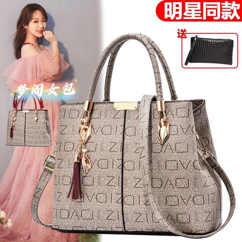 真皮質感女包2023新款潮印花百搭中年手提包韓版時尚單肩斜挎大包
