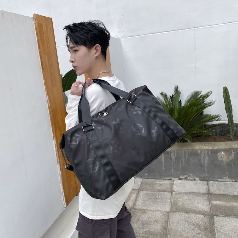 韩版大容量旅行包包女手提男单肩短途出差穿拉杆防水行李收纳袋子