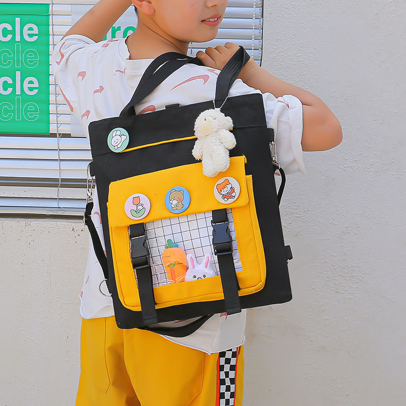 Primary school students remedial bag middle school students hand bag canvas book bag men and women children remedial bag one shoulder school bag Messenger bag