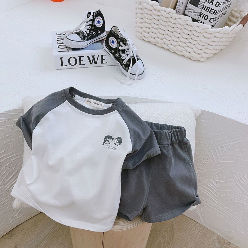 Pure cotton children's short-sleeved two-piece Korean boys and girls trendy raglan sleeves T-shirt beach shorts top suit thin