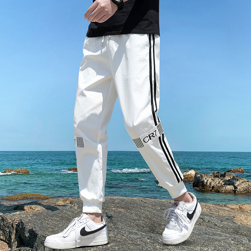 2022 new autumn men's nine-point pants youth sports long pants student trend Korean casual overalls