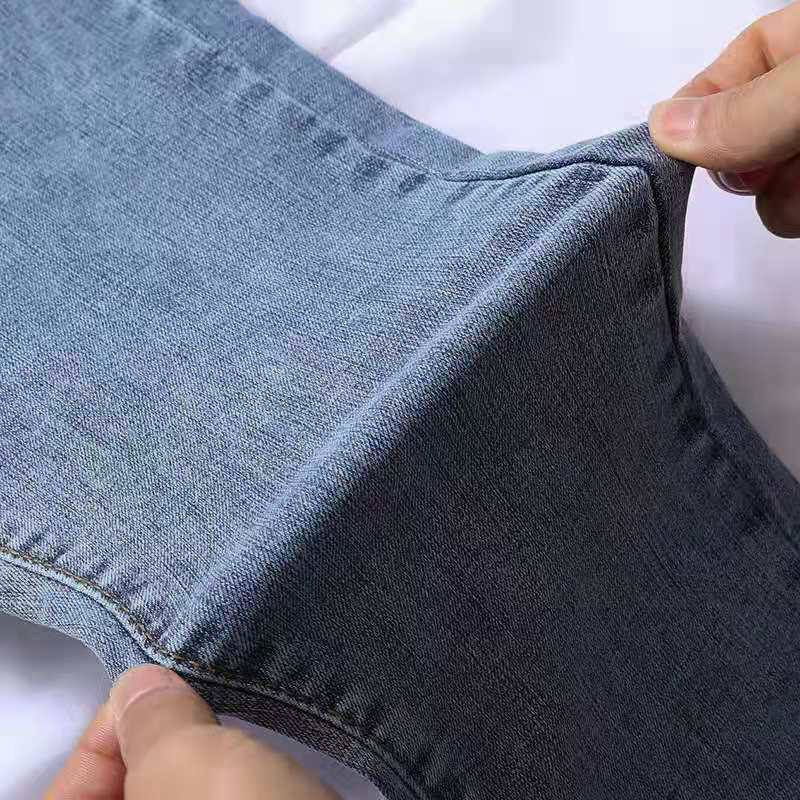 High-waisted slim skinny jeans women's 2021 spring and autumn elastic frayed pencil nine-point pants all-match trousers women's tide