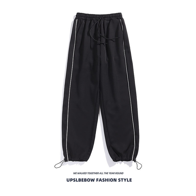 Ins pantaloni sportivi dritti e larghi per coppie, con un senso di caduta e vestibilità ampia. Pantaloni alla moda con coulisse allacciata alle gambe_voghion.com