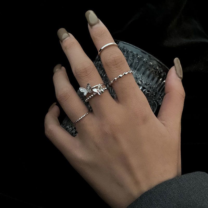 Exquisite Super Fairy Butterfly Distorted Four-piece Ring Women's Light Luxury Niche Design Sense Fashion Personality Temperament Index Finger Ring