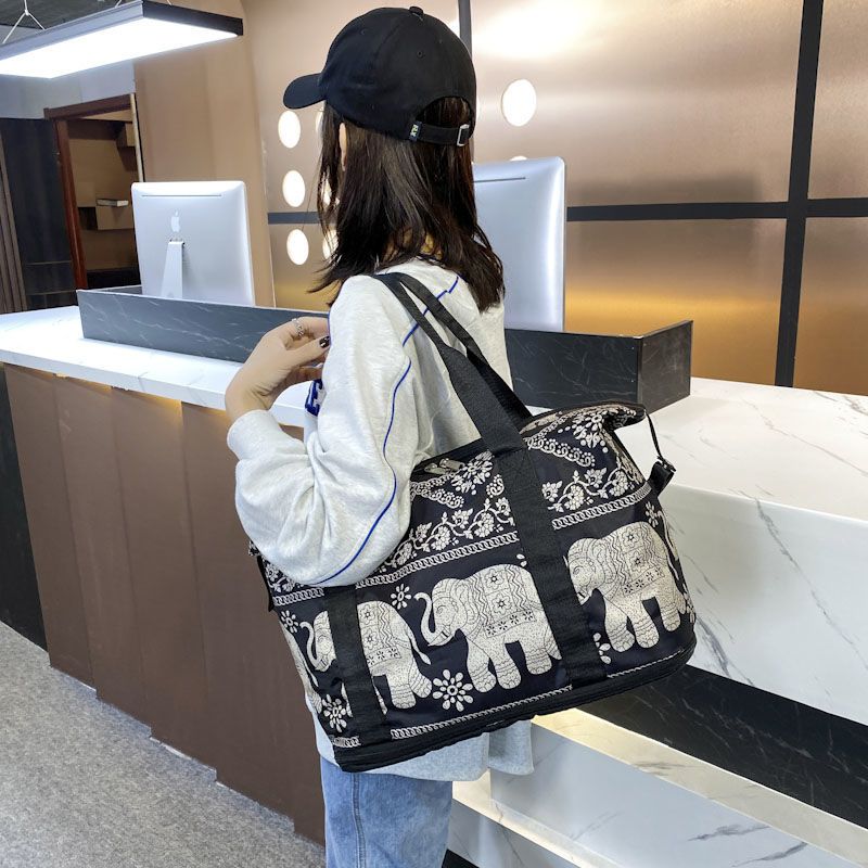 米芝妮大容量旅行包女可折叠行李待产包收纳袋便携手提短途拉杆包