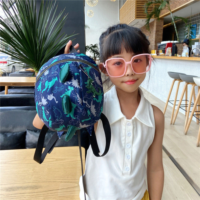 新款兒童書包幼兒防走失牽引背包男女童可愛恐龍包包時尚卡通包
