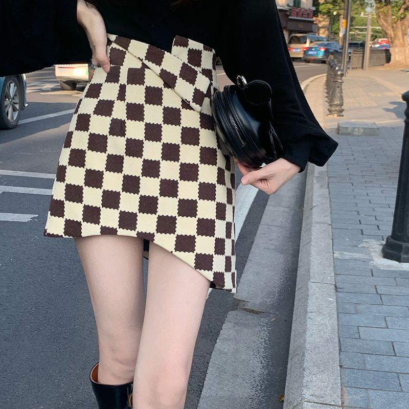 設計感不規則棋盤格半身裙女春季2023年新款a字短裙高腰包臀裙子
