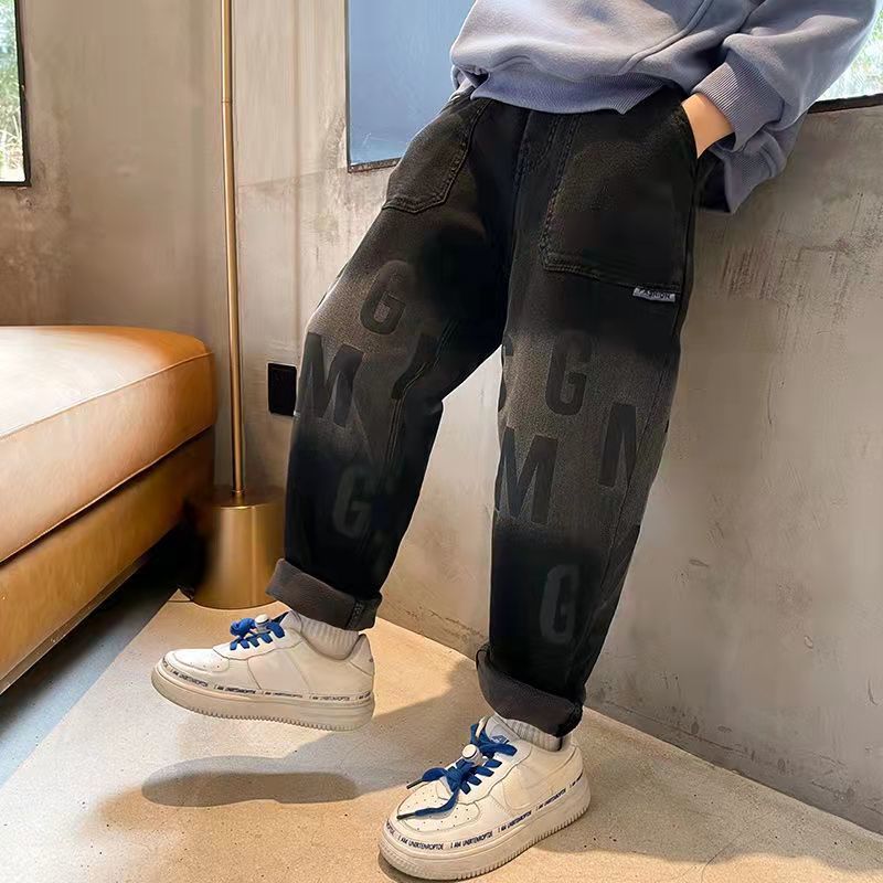 Boys 2023 spring and autumn new black casual pants autumn and winter plus velvet thickened jeans for big children to keep warm all in one
