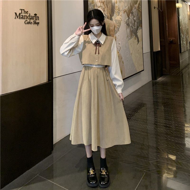 Bow dress spring and autumn  new temperament French sweet retro fake two-piece mid-length skirt for women