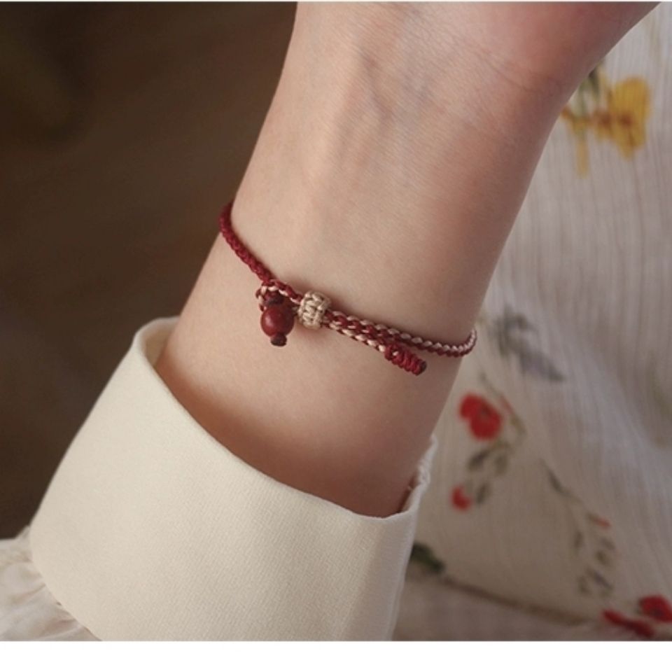Benmingnian cinnabar red rope bracelet strawberry crystal trick Peach Blossom Hand rope red rope simple Mori Department birthday gift female student