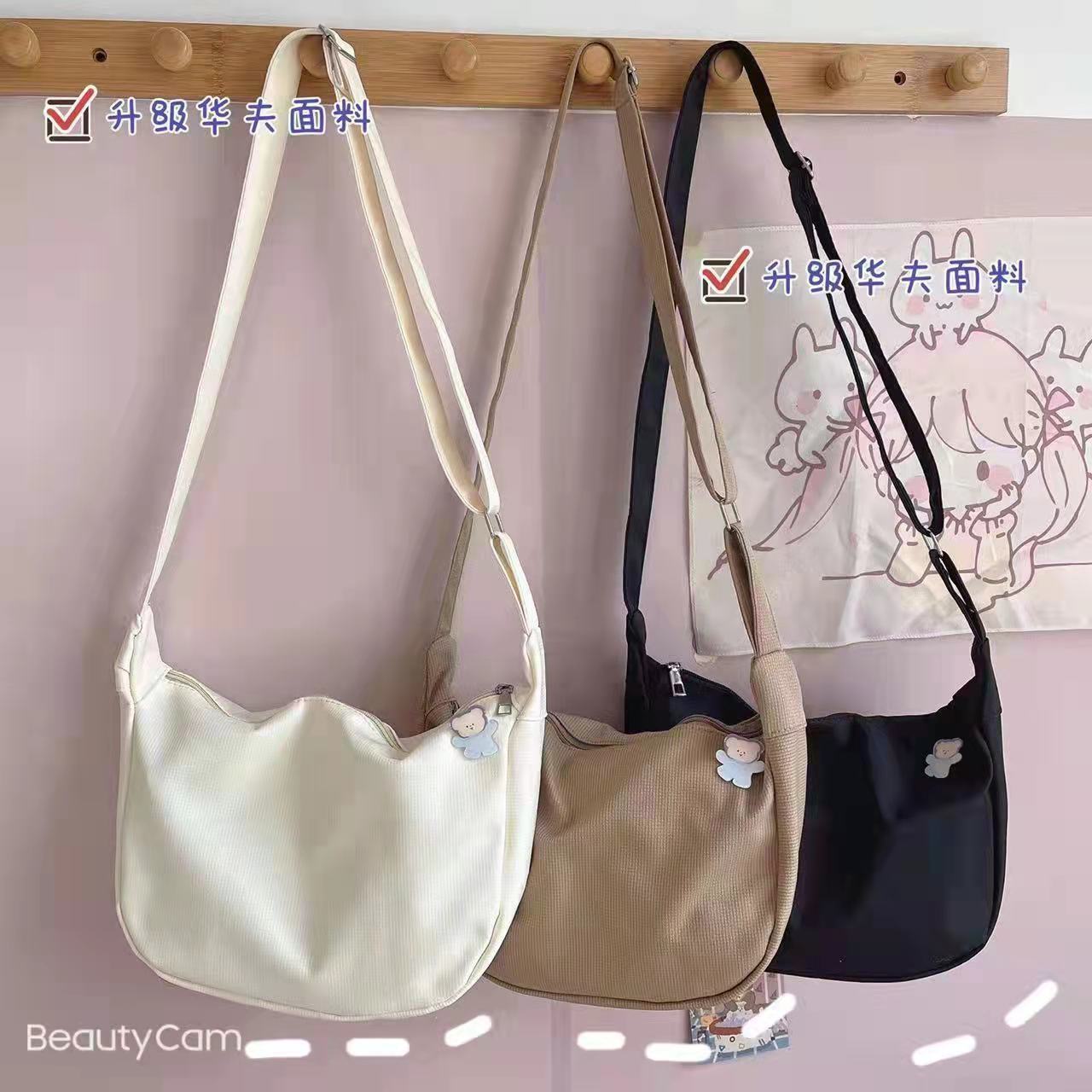 日系chic文藝純色斜挎包女秋冬ins風森系小清新簡約餃子包單肩包