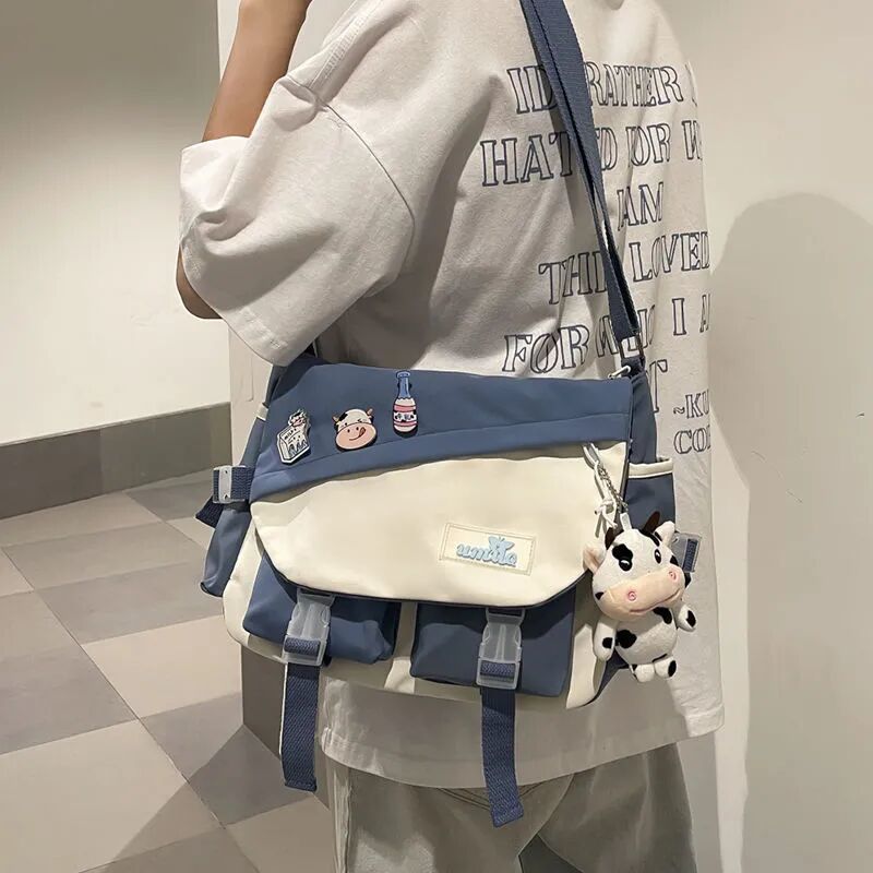 斜挎包男潮牌斜跨單肩包女日系大容量撞色休閒學生郵差包工裝包男