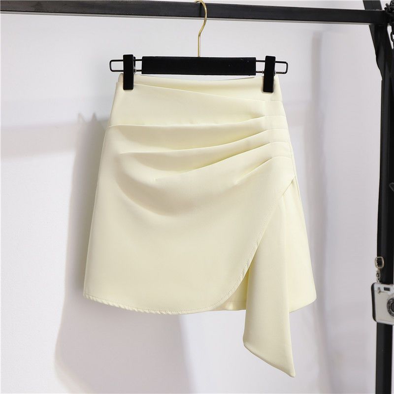 Irregular skirt women's spring and autumn short skirt design sense niche bag hip skirt drape thin section high waist a-line suit skirt