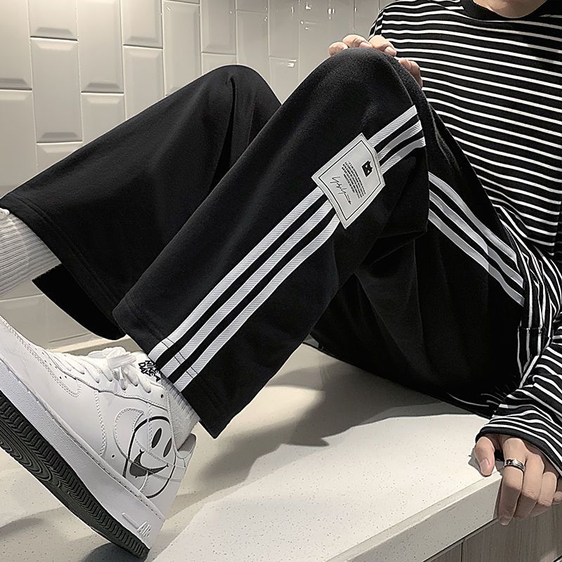 Casual pants men's spring and autumn summer Hong Kong style nine-point trend thin striped sports loose three-bar student straight pants