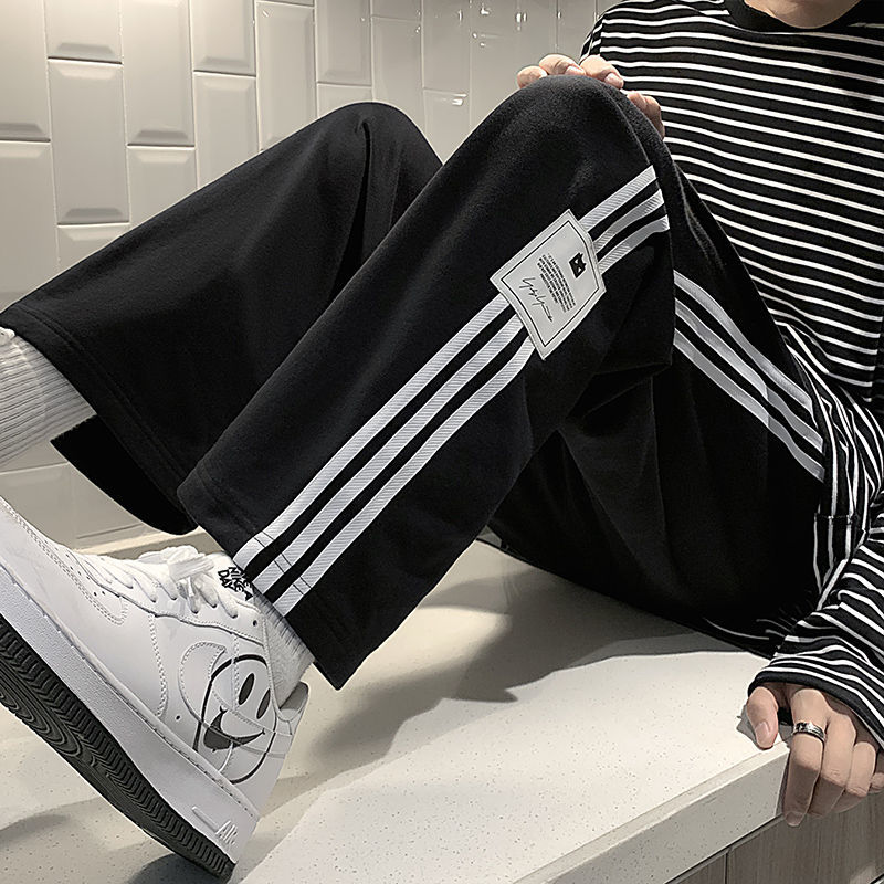 Plaid literary men's casual pants men's spring striped sports pants Hong Kong style loose new trend straight trousers