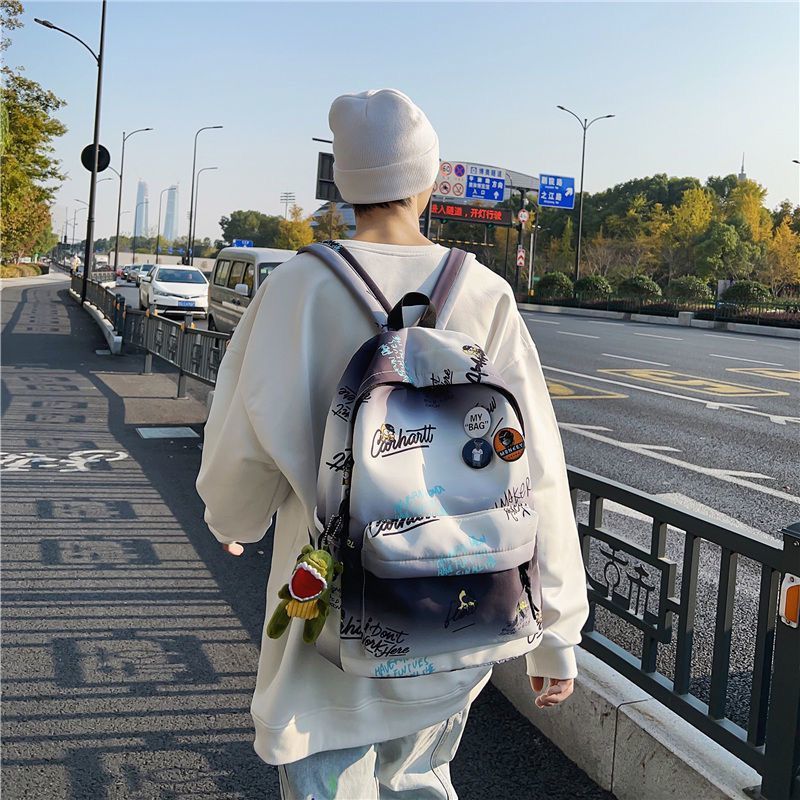 Trendy cool schoolbag male simple Korean version junior high school student light shoulder bag female gradient large capacity senior durable college student