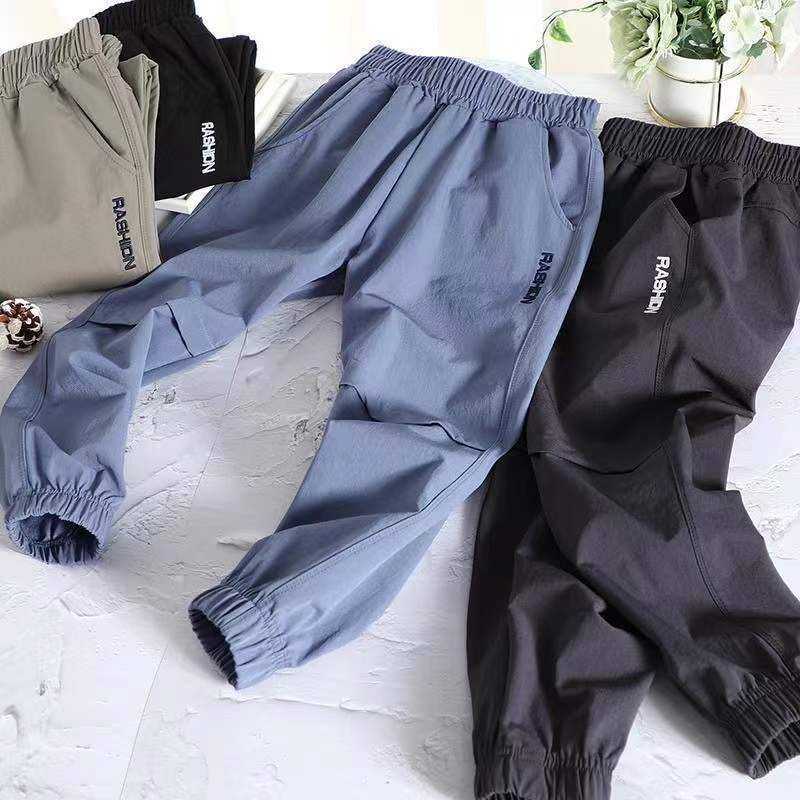 Boys' quick-drying sports pants summer pants  new style big children's four-sided elastic anti-mosquito pants loose version