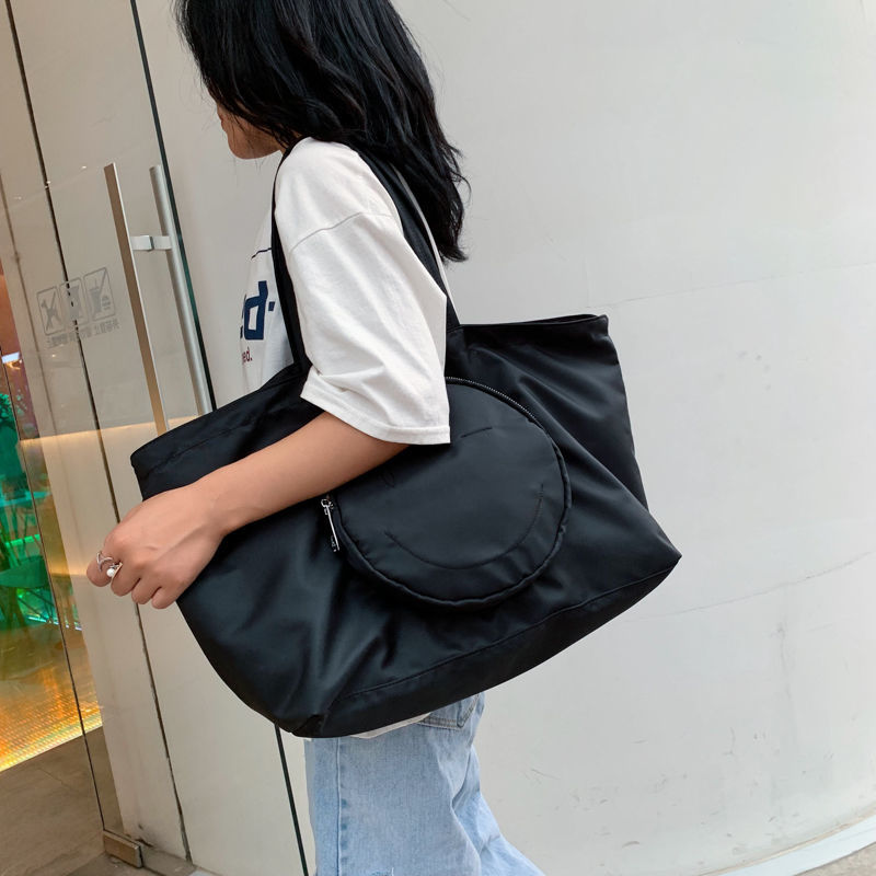 网红旅行包女手提行李袋女韩版大容量可爱小短途轻便防水学生潮包