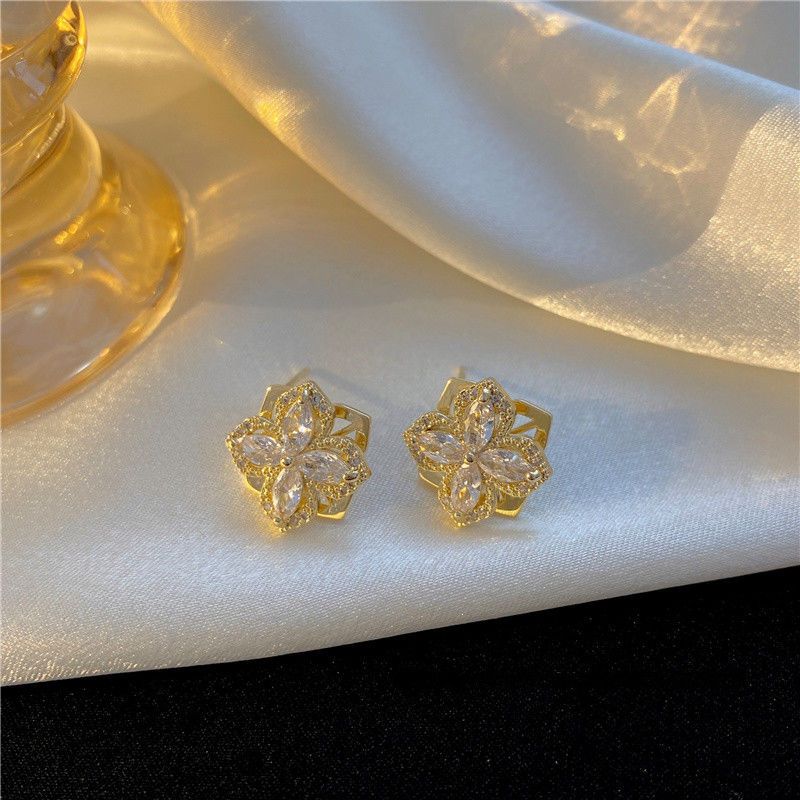 2022 autumn new temperament and fashion zircon rotatable four-leaf flower earrings female Douyin net red all-match earrings female