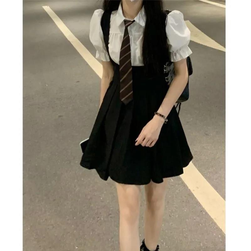2022 new Korean version of French college retro bubble sleeve short sleeve top hot girl slim strap skirt two-piece set