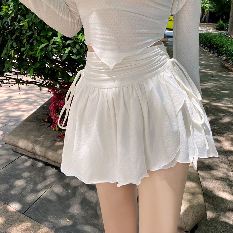 Pure lust-style white skirt for women, stylish drawstring pleated A-line short culottes, high-waisted anti-exposure irregular skirt