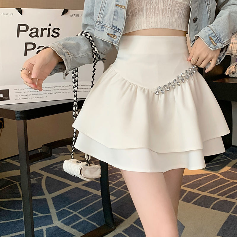 A-line skirt women's anti-exposure niche  spring white high-waisted short skirt slimming puffy skirt