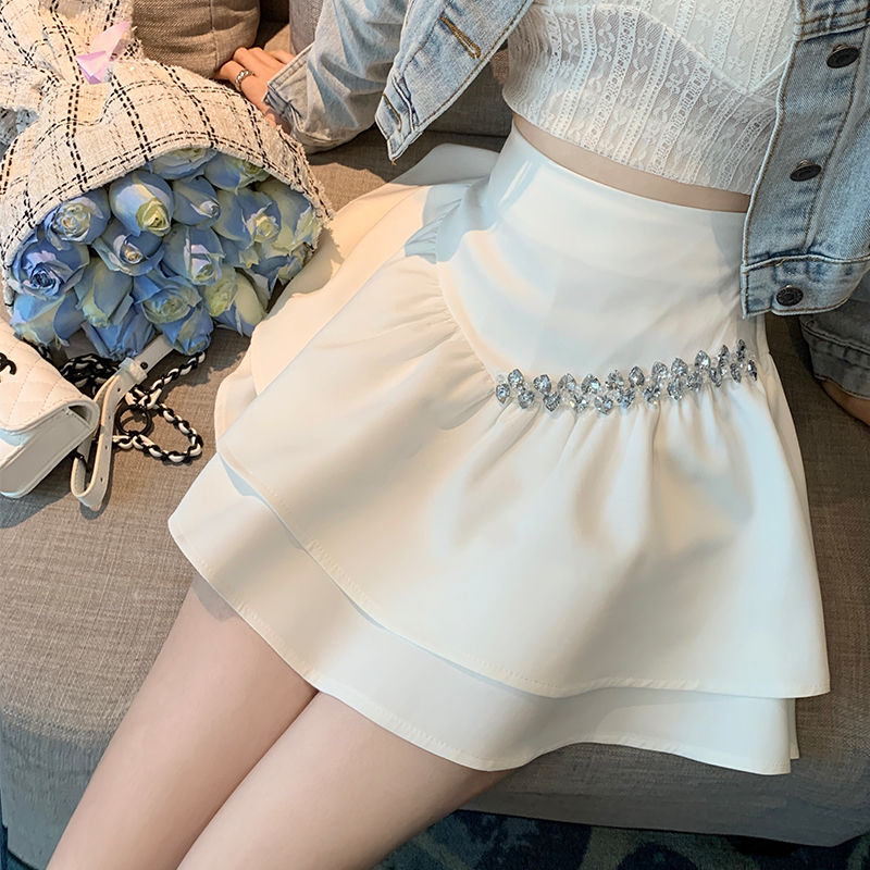 A-line skirt women's anti-exposure niche  spring white high-waisted short skirt slimming puffy skirt