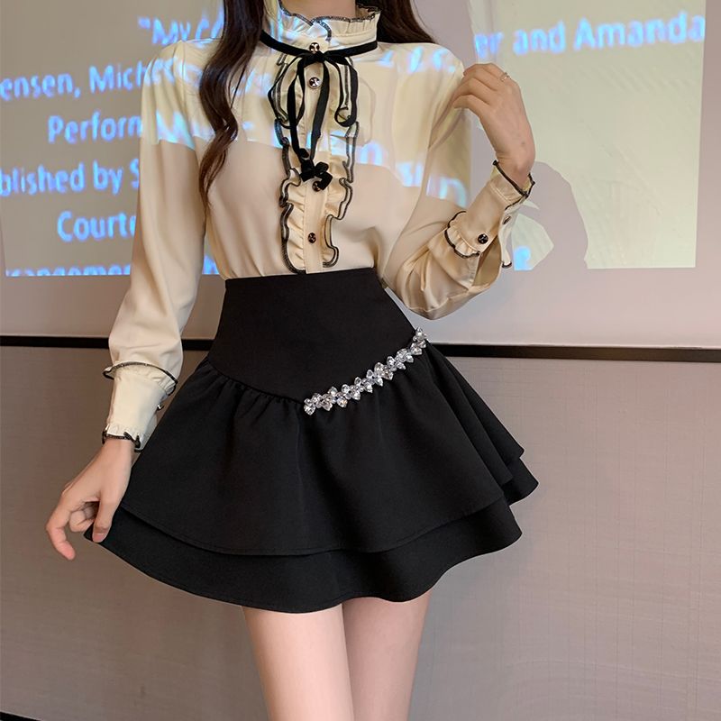 A-line skirt women's anti-exposure niche  spring white high-waisted short skirt slimming puffy skirt