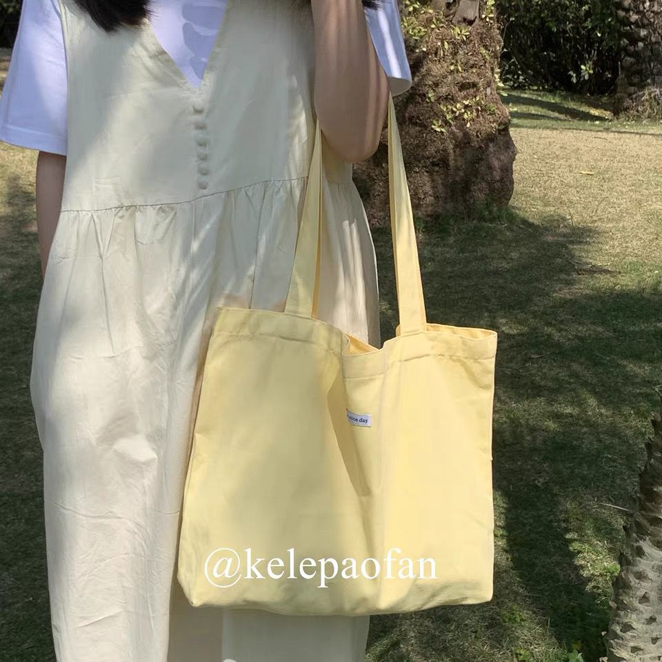 Summer healing gentle milk yellow shoulder bag Korean ins twill soft canvas bag student class handbag bag
