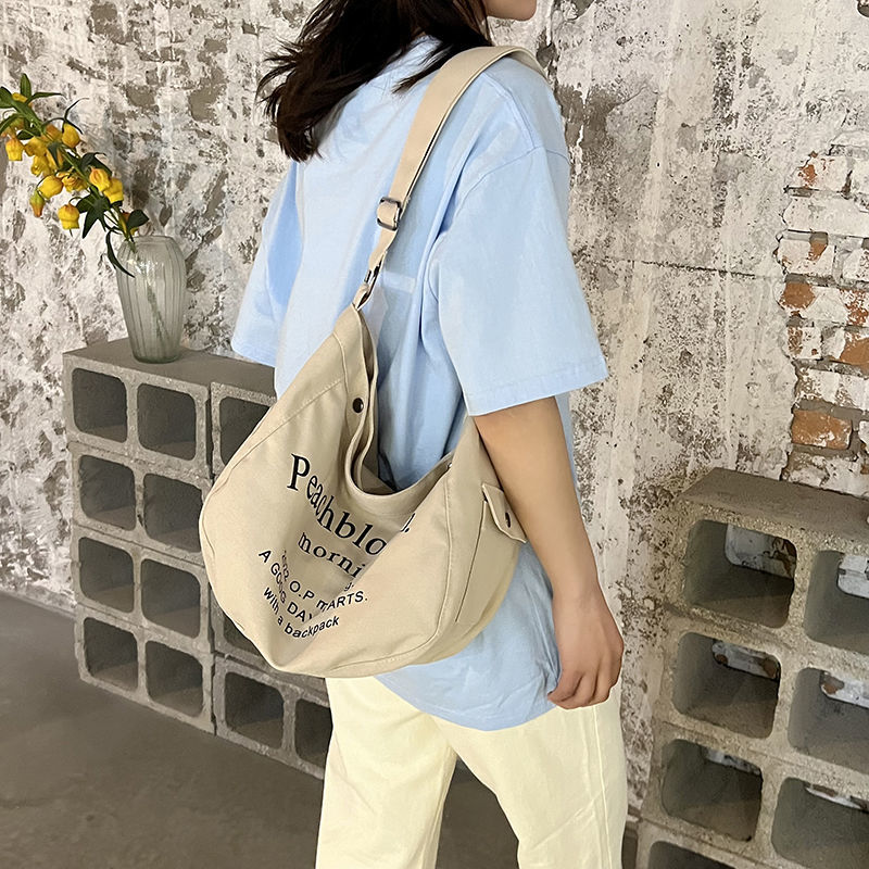 New khaki Korean version canvas bag female student letter retro Messenger bag all-match large-capacity shoulder bag