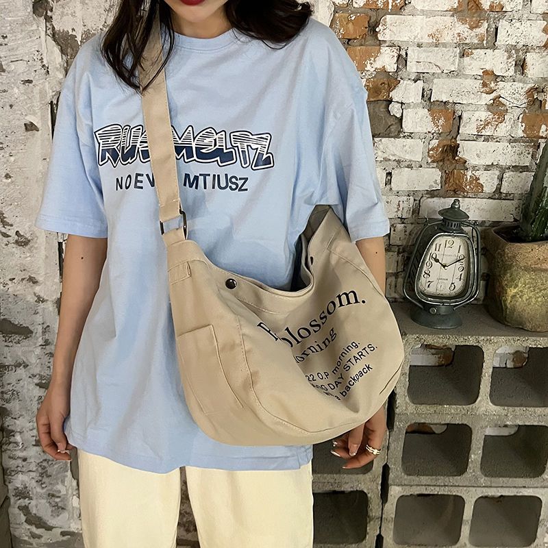 New khaki Korean version canvas bag female student letter retro Messenger bag all-match large-capacity shoulder bag