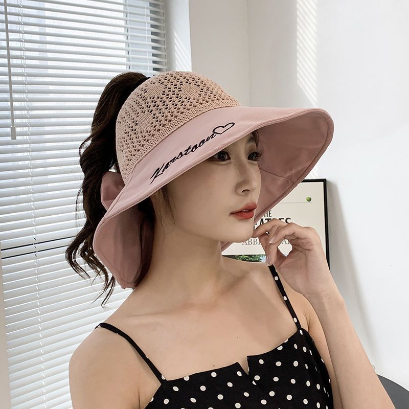 Spring and summer beach sun protection and sunshade women's hat hollow top folding UV protection large edge hollow straw hat Korean versatile hat