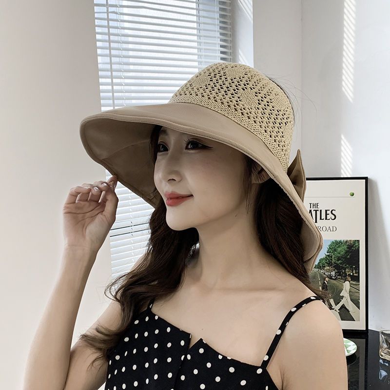 Spring and summer beach sun protection and sunshade women's hat hollow top folding UV protection large edge hollow straw hat Korean versatile hat
