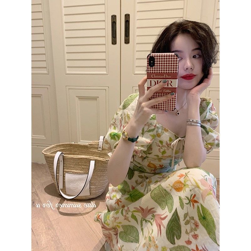 2023 summer new women's high-end sense French retro long skirt sweet fried street design sense strap floral dress
