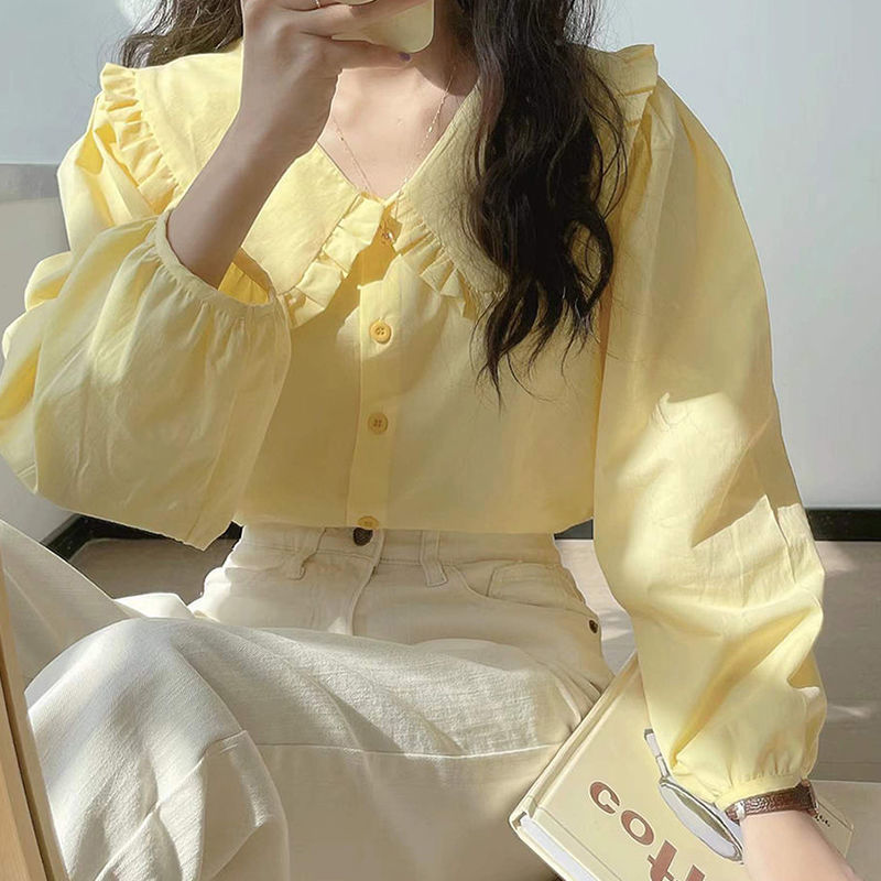 奶黃色長袖襯衫女春季chic法式復古娃娃領上衣設計感小眾奶甜襯衣