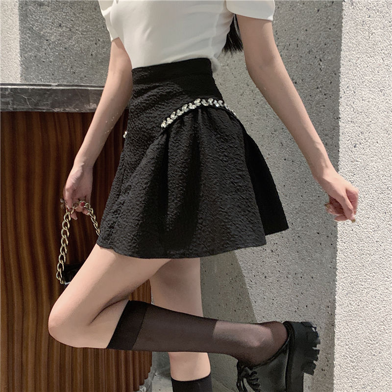 Black short skirt niche irregular diamond skirt summer  new high-waist slim fluffy A-line skirt
