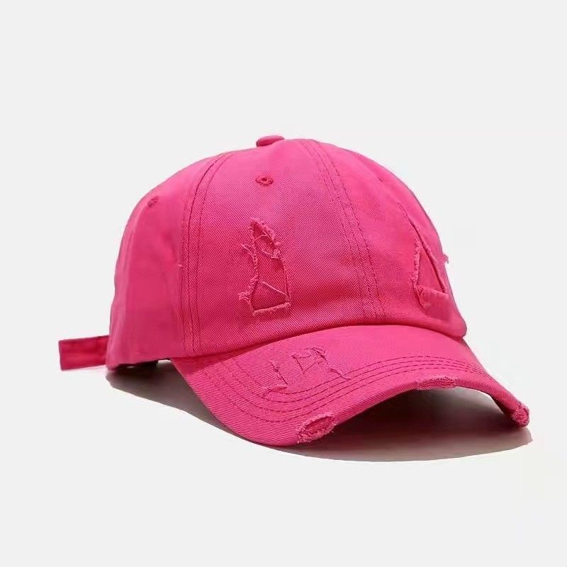 Korean version of the old broken hole black baseball hat female summer personality trendy men and women solid color hip-hop sunshade cap