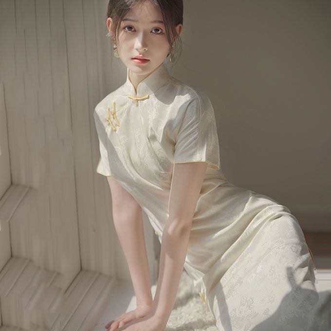 高端白色旗袍少女夏季短袖2023年新款改良高級感氣質復古年輕長款